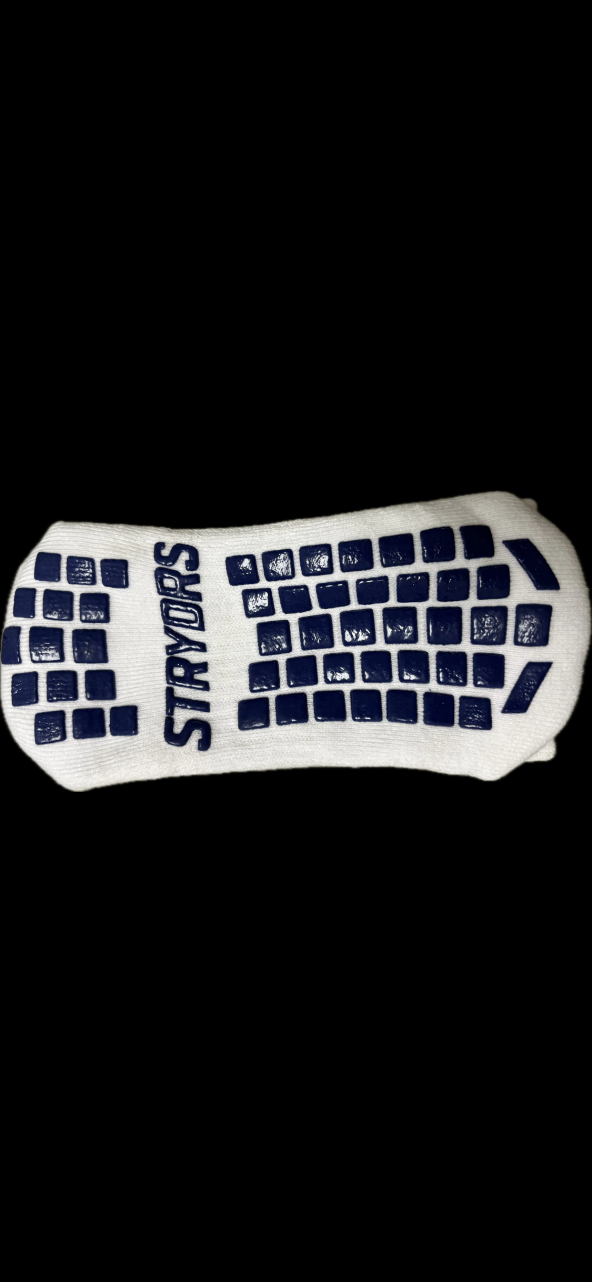 "Grip socks close-up showing grip pattern detail"